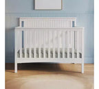 Lit de bébé convertible, commode avec plateau à langer et fauteuil à bascule confortable